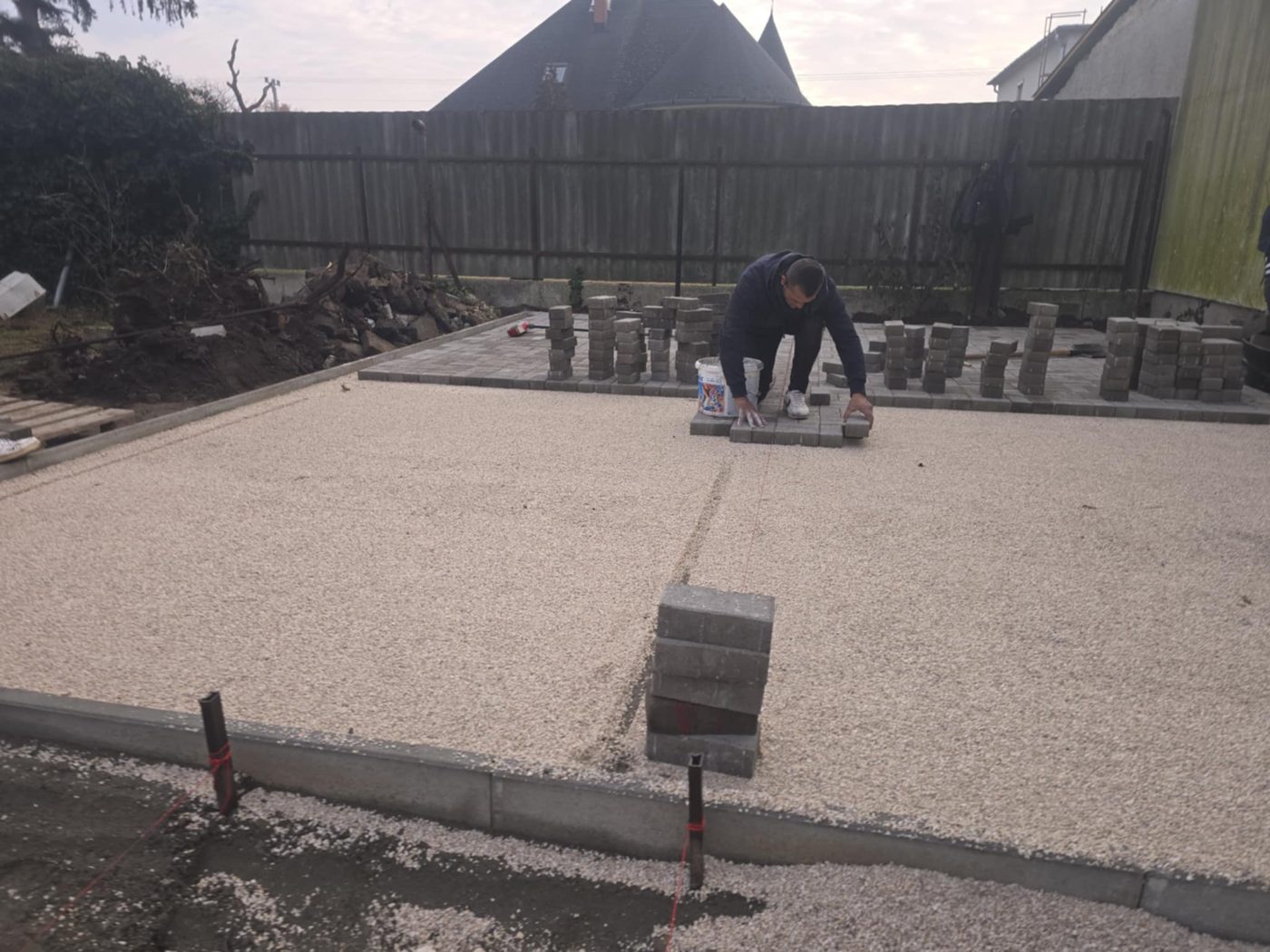 Puddles standing on block paving laid without falls